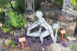 One of the sculptures in the Thai Yoga outcrop at Wat Po.