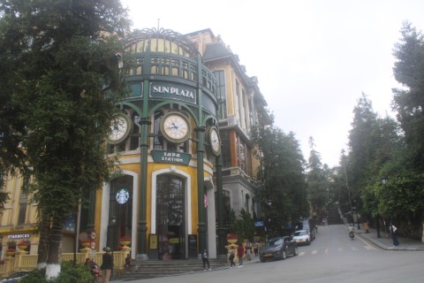 Sun Plaza is one of the most imposing buildings in Sa Pa, an otherwise sleepy alpine town in Northern Vietnam. Sun Plaza is located on the southwest corner of Sa Pa Plaza and it contains a shopping center and restaurants. This photo is taken from across the street on Sa Pa Plaza.