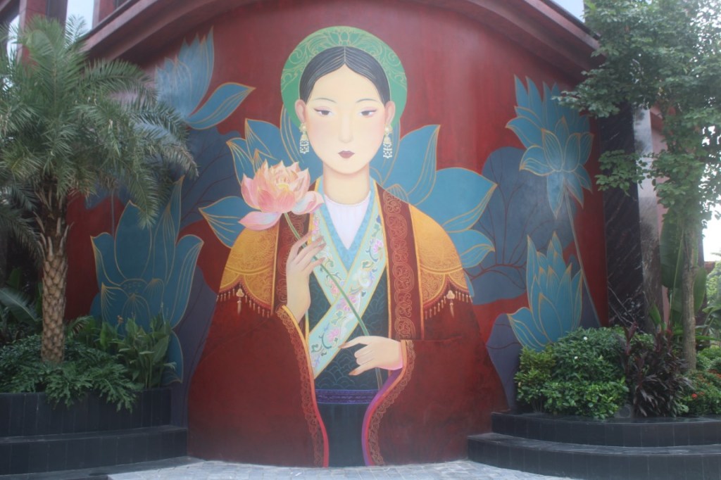 A lotus blossom themed mural on a building on the east side of West Lake (Hồ Tây) in Hanoi, Vietnam.
