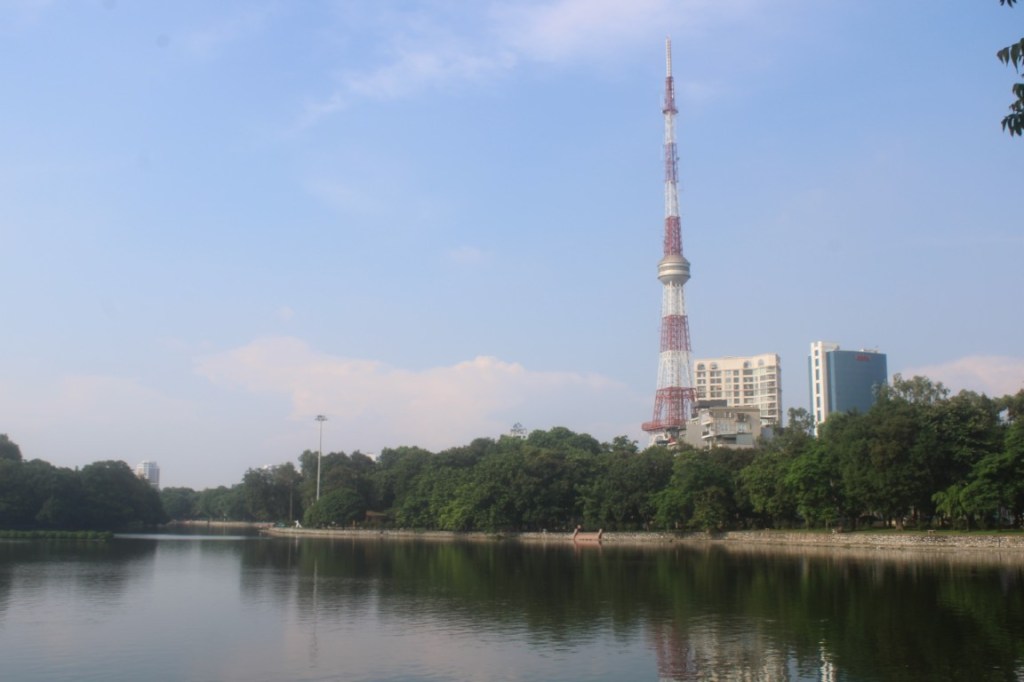 VTC Tower from the south end of Bay Mau Lake in Thong Nhat Park.