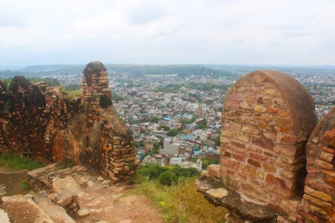 Gwalior city through a crenulated parapet.