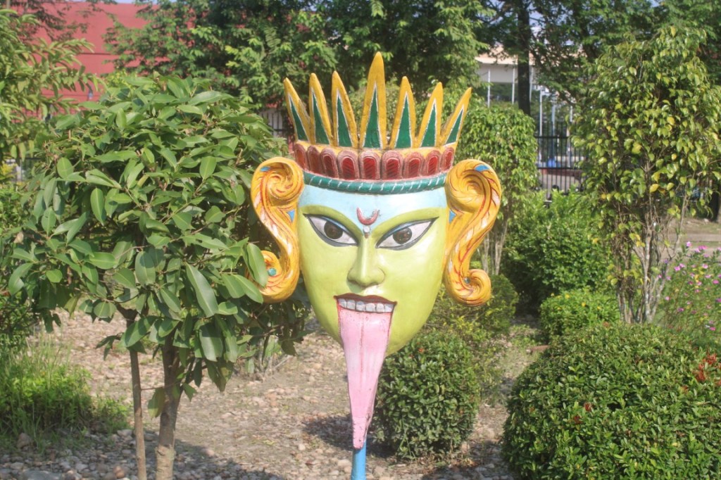 Mask of Kali (or a stylized version thereof) in the Mask Garden of Kolkata's Eco Park.