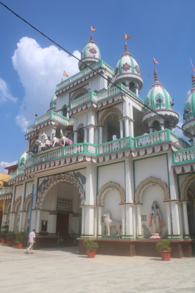 The gate of Sri Jagannath Temple of Agartala, Tripura, India. Taken from inside the Temple grounds on a blue sky day. 
