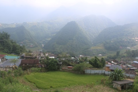 Taken in Northern Vietnam, Sapa District, showing village and mountains.