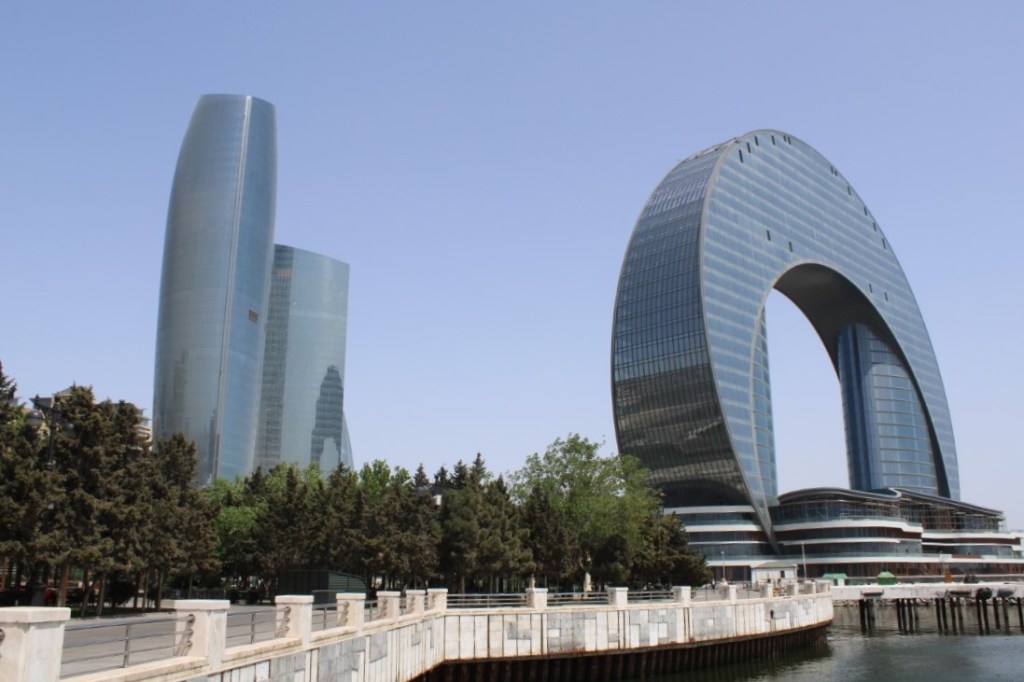 A photograph of The Crescent Residences, an architecturally interesting building on Baku's Caspian shoreline.
