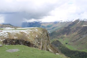 Photograph taken at Jvari Pass in the Republic of Georgia as a rain cloud works up the valley. The previous day, it had snowed. 