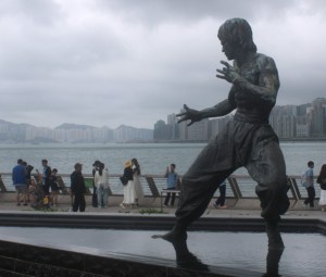 Bruce Lee statue by Cao Chong-En located on the Avenue of Stars, Tsim Sha Tsui East, Kowloon, Hong Kong.