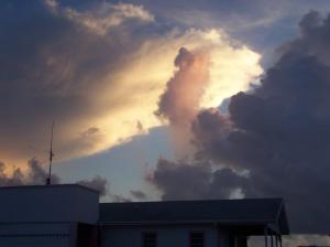 Photograph of clouds in various shades of light and dark taken at Caye Caulker, Belize.