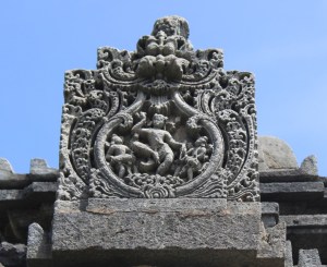 Photograph of an ornately carved stone block on Doddagaddavalli Lakshmi Devi Temple in Karnataka, India.