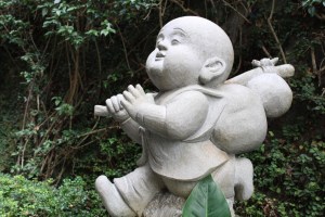Photograph of a statue of a young vagabond taken at Fo Guang Shan [佛光山,] near Kaohsiung, Taiwan.