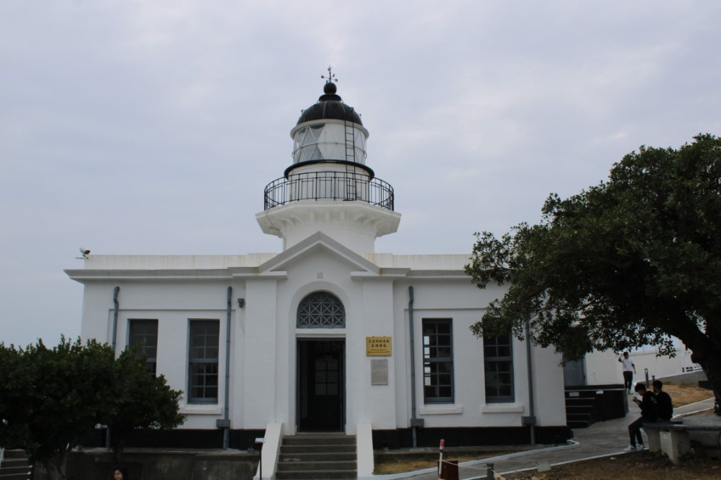 This is the Kaohsiung Lighthouse at the rocky end point of the Qijin District peninsula. 