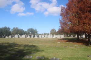 Photograph of a cemetery on a beautiful day in the Fall, taken in New Orleans, Louisiana.