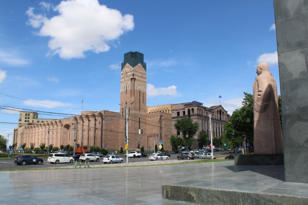 Photograph of the Yerevan Municipality Building taken across Myasnikyan Square.