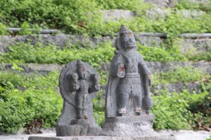Photograph of stone carved figurines at the temple on Kaurava Kunda in Chikballapur, Karnataka, India.  