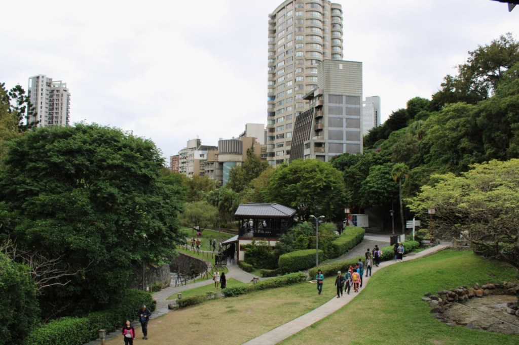 A photograph of Beitou, Taiwan with Beitou Park in the foreground.