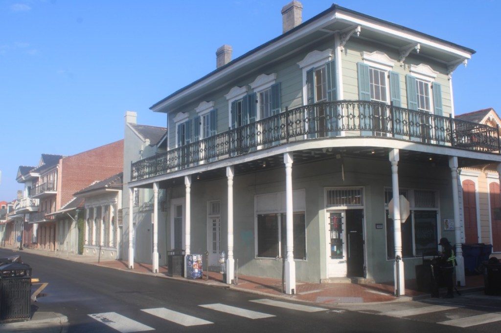 Photograph of a building with a gallery in the French Quarter of New Orleans.