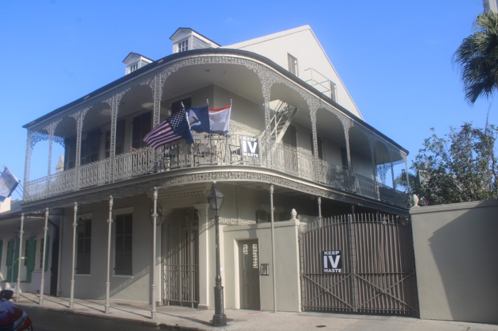 Photograph of a building with a gallery in the French Quarter of New Orleans.
