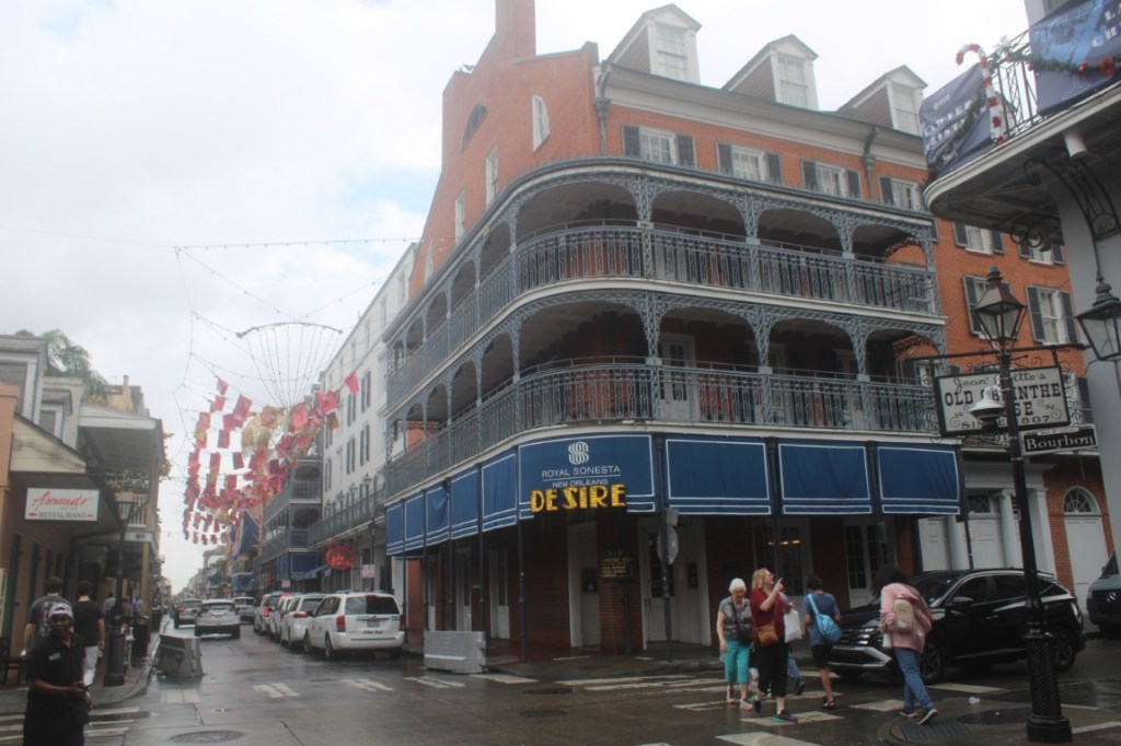 Photograph of a building with a gallery in the French Quarter of New Orleans.