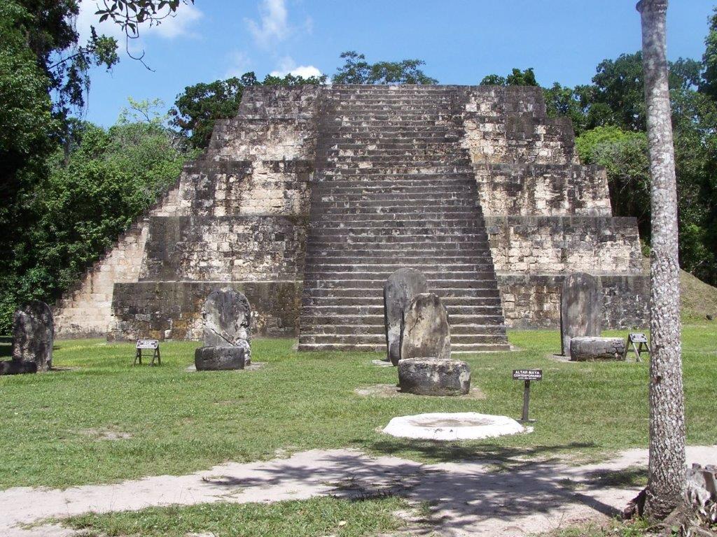 Photograph of a temple with steep steps at Tikal in Guatemala.