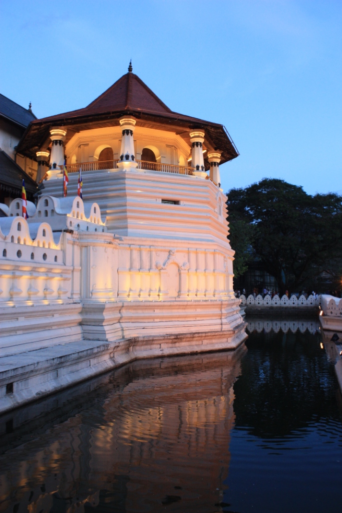 Photograph of a moat and tower at the Temple of the Tooth in Kandy, Sri Lanka.