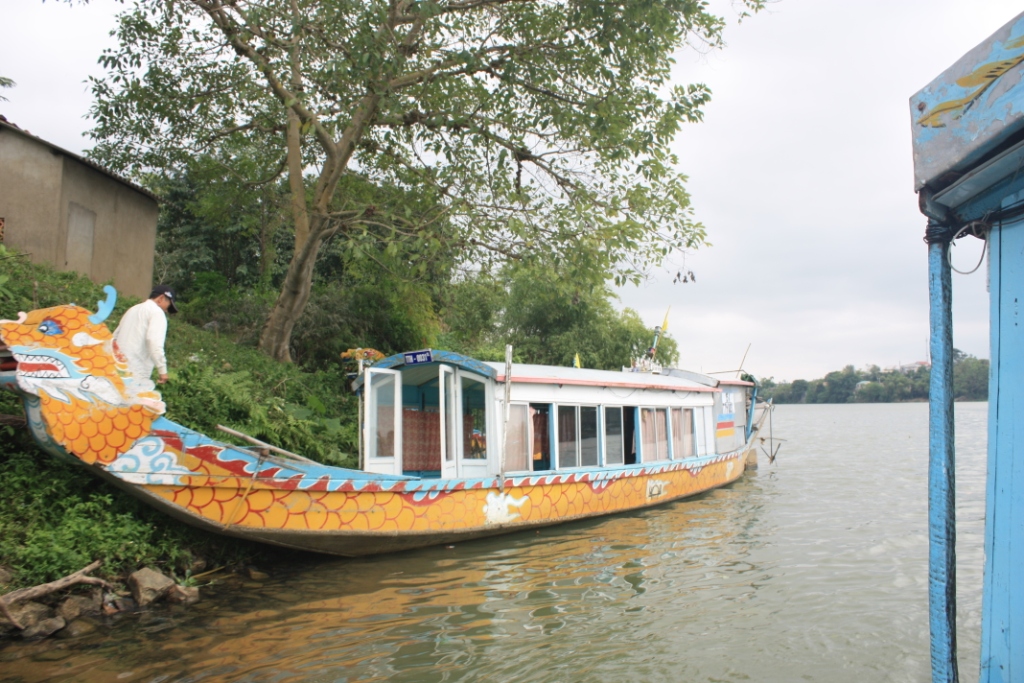 Photograph of a docked river ferry on Hue's Perfume River.