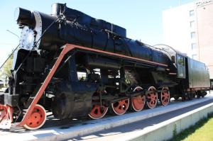 Photograph of a steam engine locomotive taken in Tallinn, Estonia.