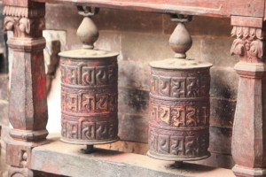 Photograph of prayer wheels at a Vajrayana Buddhist Temple in Bhaktapur, Nepal.