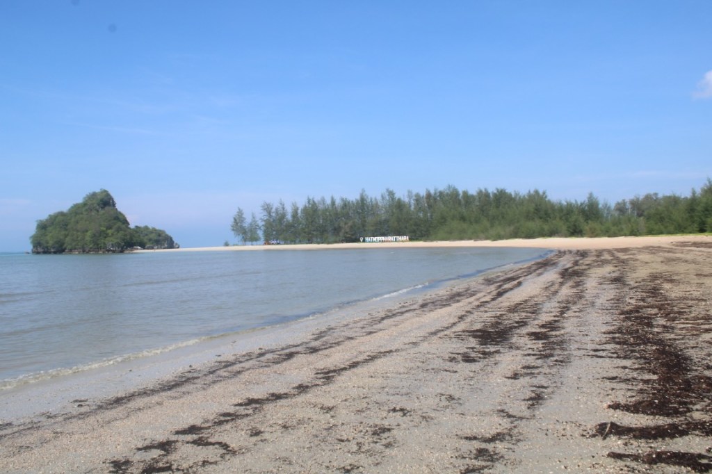 Photograph of Ao Nang Beach and the rocky promontory at Hat Noparat Thara.