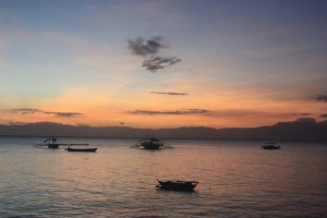Photograph of sunset taken at Moalboal, Philippines across the Tanon Strait.