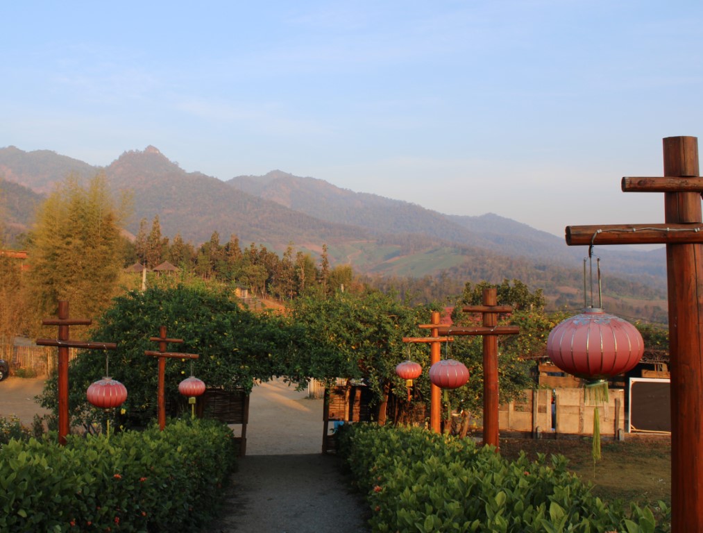 Photograph of the entrance to Yun Lai Viewpoint with its Chinese lanterns and mountainous backdrop.