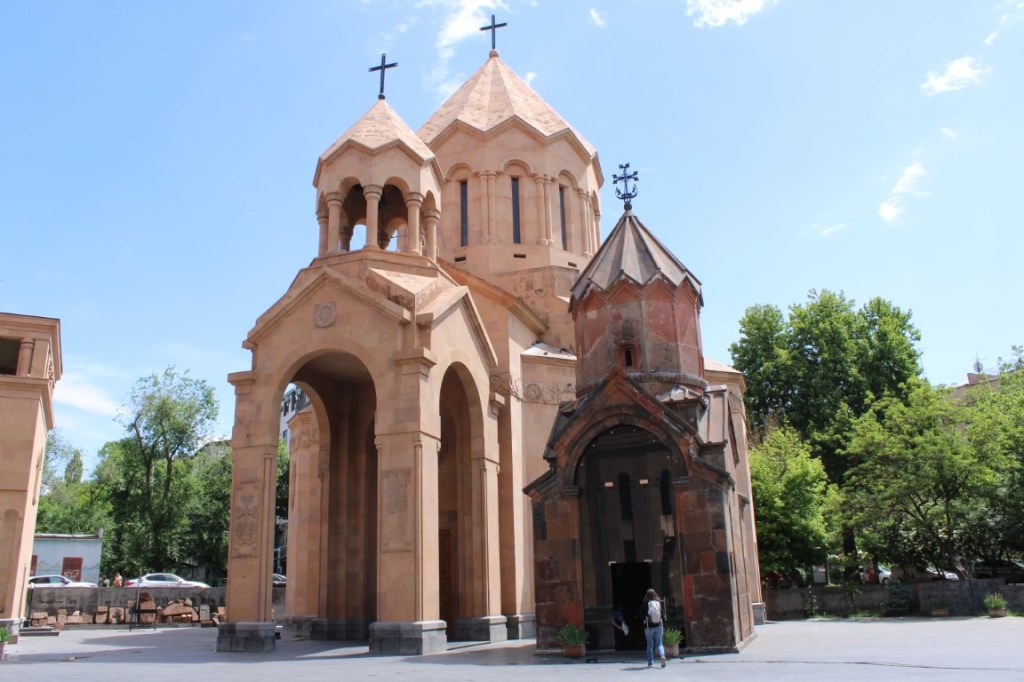 Photograph of St. Anna Church (larger and sand colored) and Katoghike church (smaller and darker) in Yerevan, Armenia.