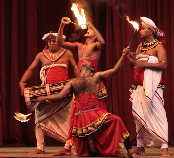 Photograph of fire-eaters at the Kandyan Cultural Center in Kandy, Sri Lanka.