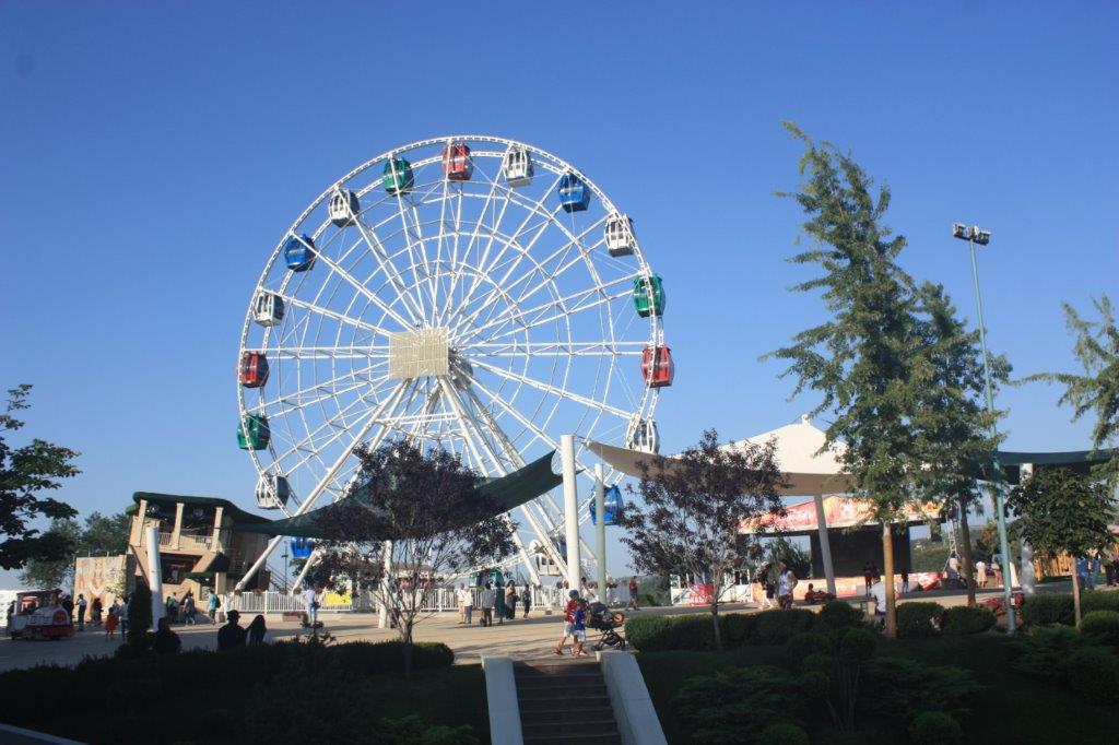 Photograph featuring a Ferris wheel taken at Köktöbe (Blue Hill) on the edge of Almaty, Kazakhstan.