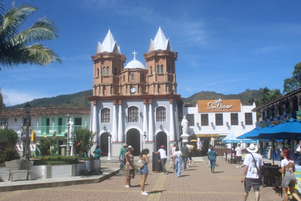 Photograph of the town square of Réplica del Vieja Peñol, a copy of a village that was flooded when a river was damned to make a reservoir. 