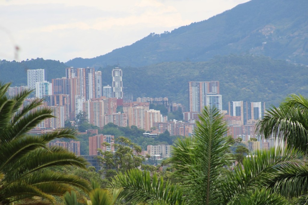 Photograph of Medellin high-rises on the hill slope taken from el Castillo Museum and Gardens.