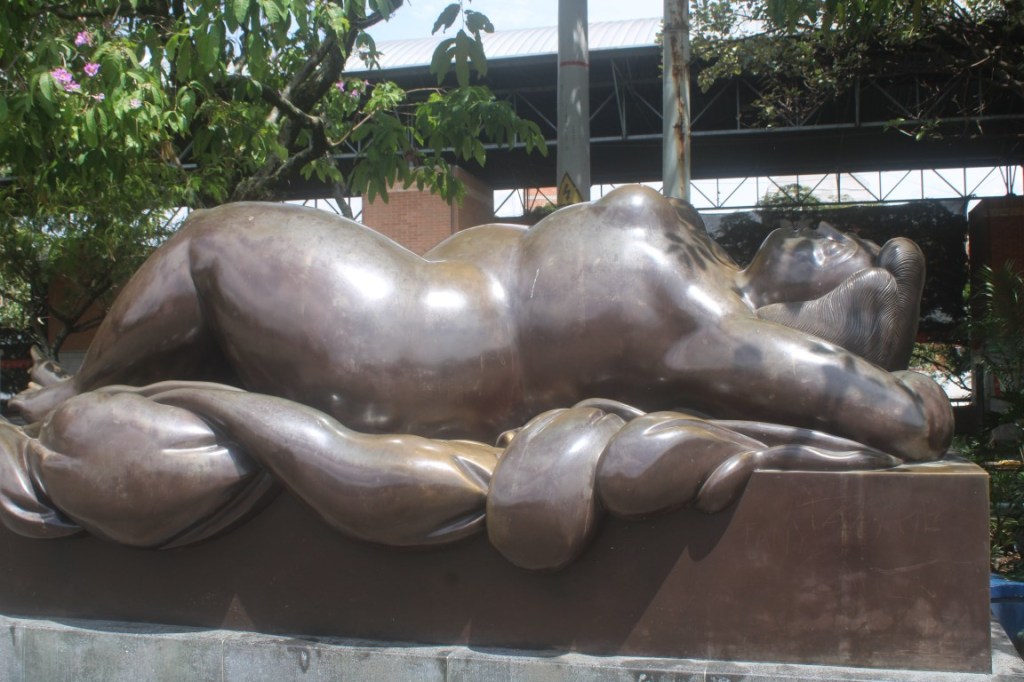 Photograph of a supine woman in San Antonio Park of Medellin, Colombia.