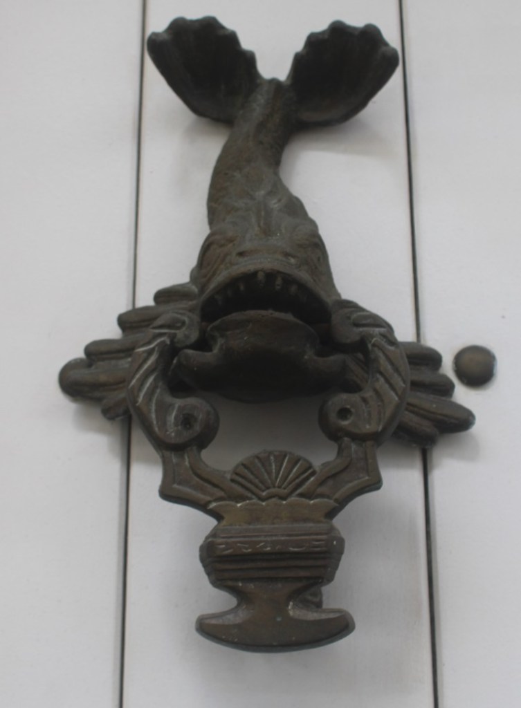 Photograph of a fish doorknocker taken in Cartagena, Colombia.