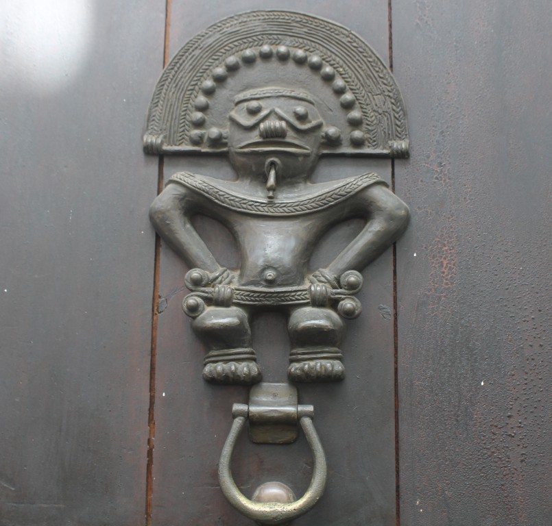 Photograph of a tribal art doorknocker taken in Cartagena, Colombia.