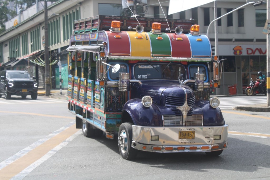 Photograph of one of Medellin's colorful Chiva Buses.