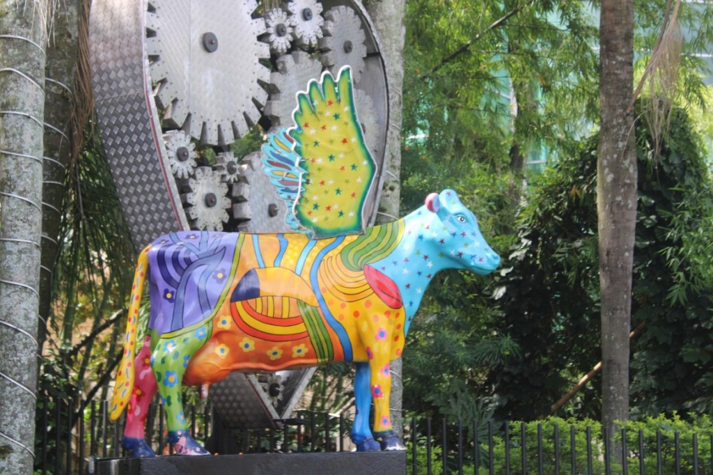 Photograph of a winged cow sculpture taken in Medellin, Colombia. 
