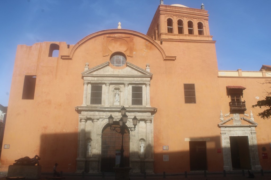 Photograph of the Claustro De Santo Domingo in Cartagena, Colombia, catching the early morning sunlight. 