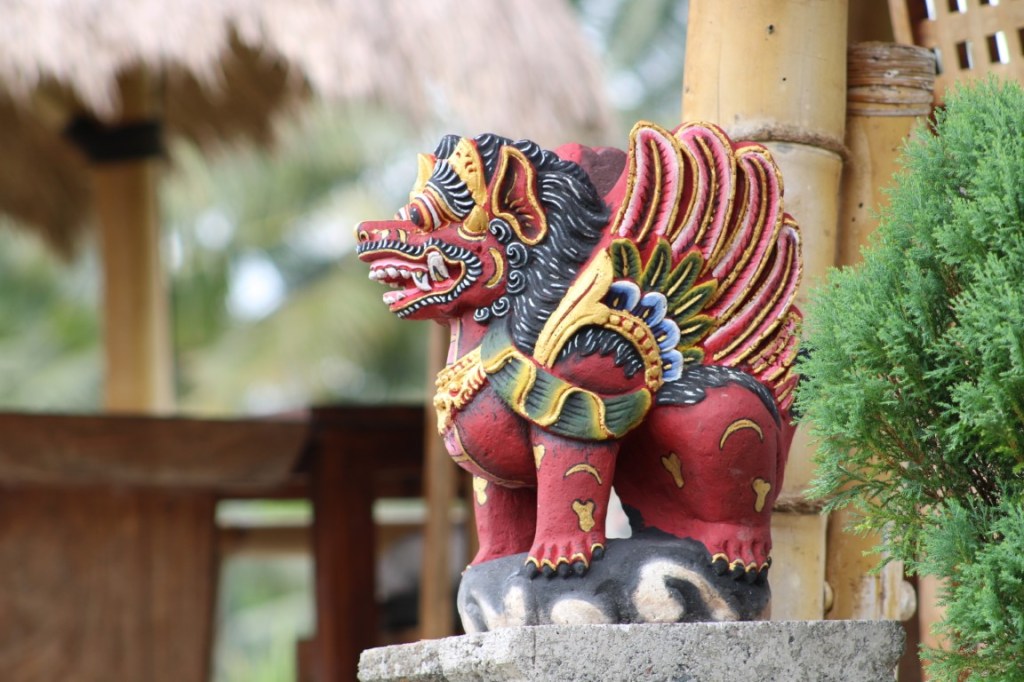 Photograph of a temple guardian statue taken on Bali in Indonesia.