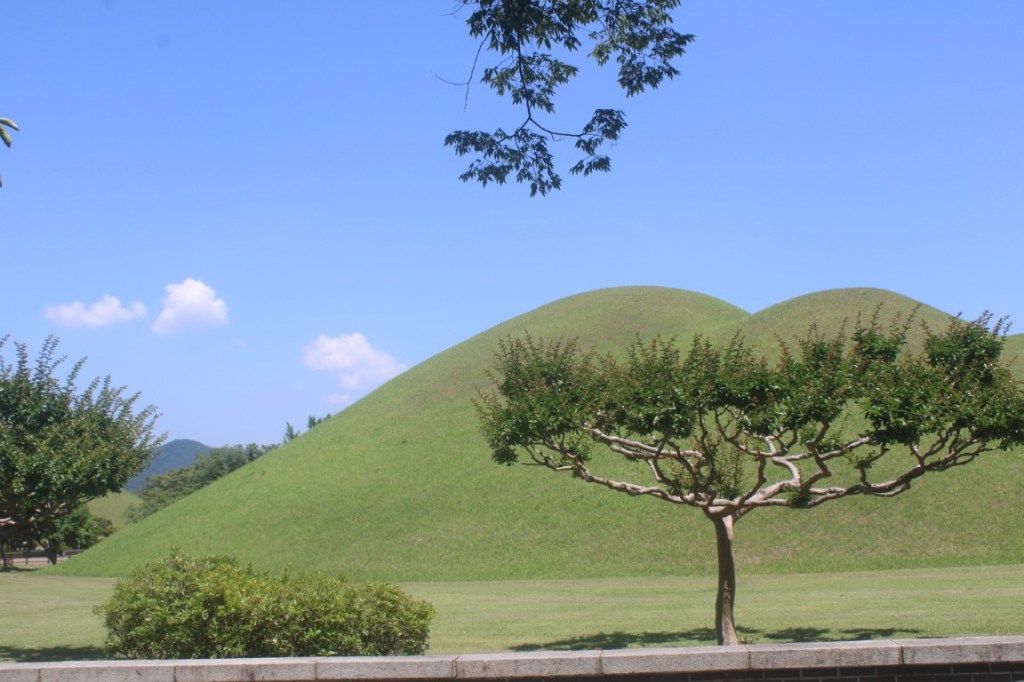 Photograph of a burial mound in the Daereungwon Tomb Complex in Gyeongju, South Korea.